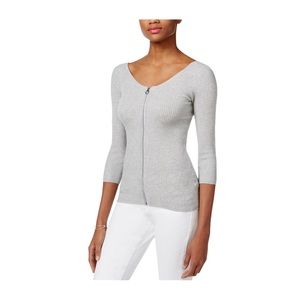 Zip up sweater by Guess. Never worn. XS